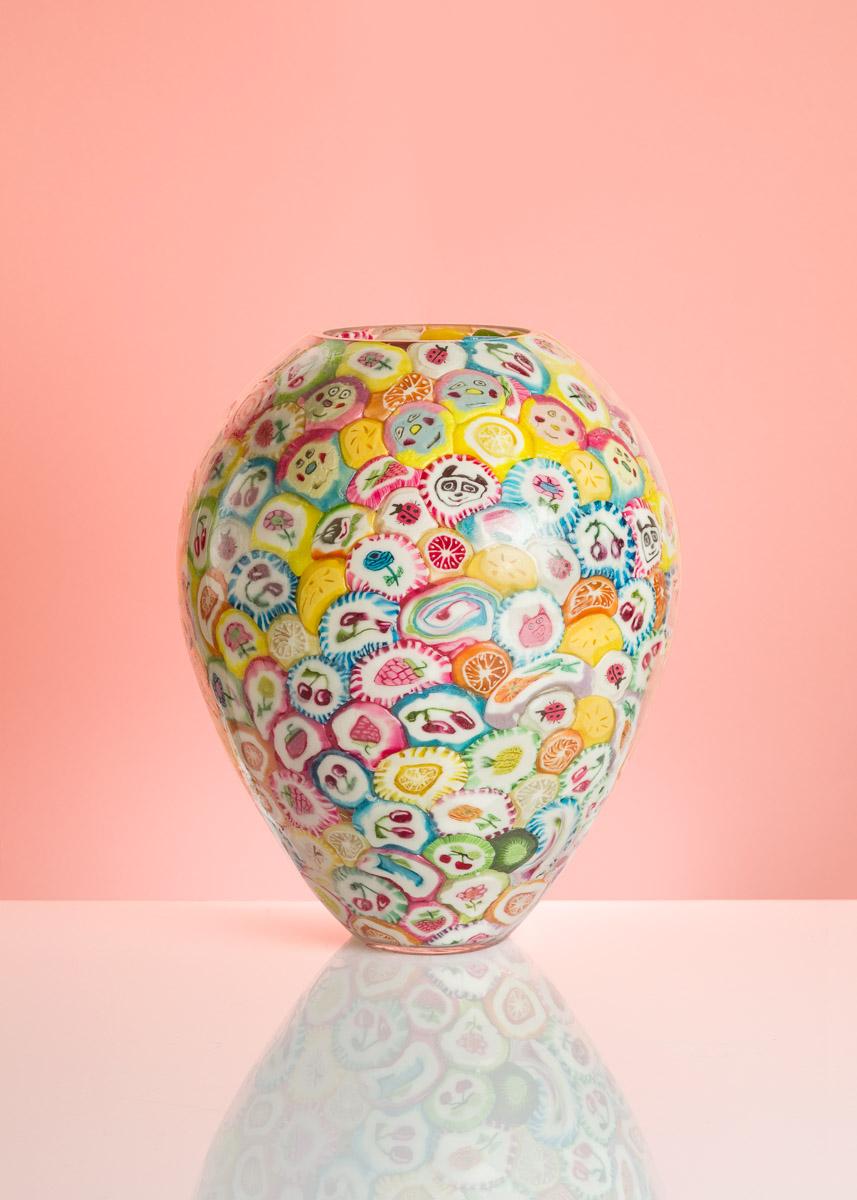 Lollipop vases are the most iconic art-pieces by Anna Jozova. It's a humorous reaction to expensive and demanding technique of Murano glass. Lollipops are glued from inside of the handblown crystal shape and later protected by clear material. All of