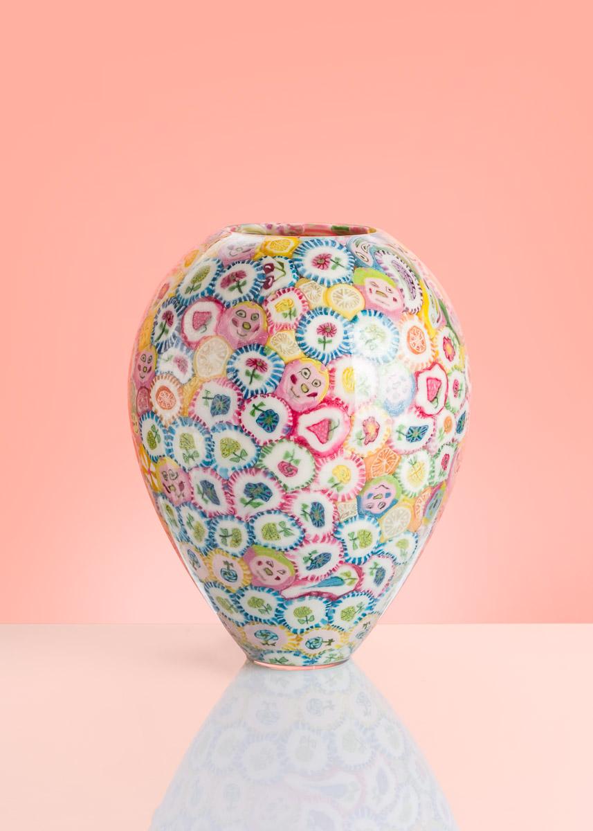 Lollipop vases are the most iconic art-pieces by Anna Jozova. It's a humorous reaction to expensive and demanding technique of Murano glass. Lollipops are glued from inside of the handblown crystal shape and later protected by clear material. All of