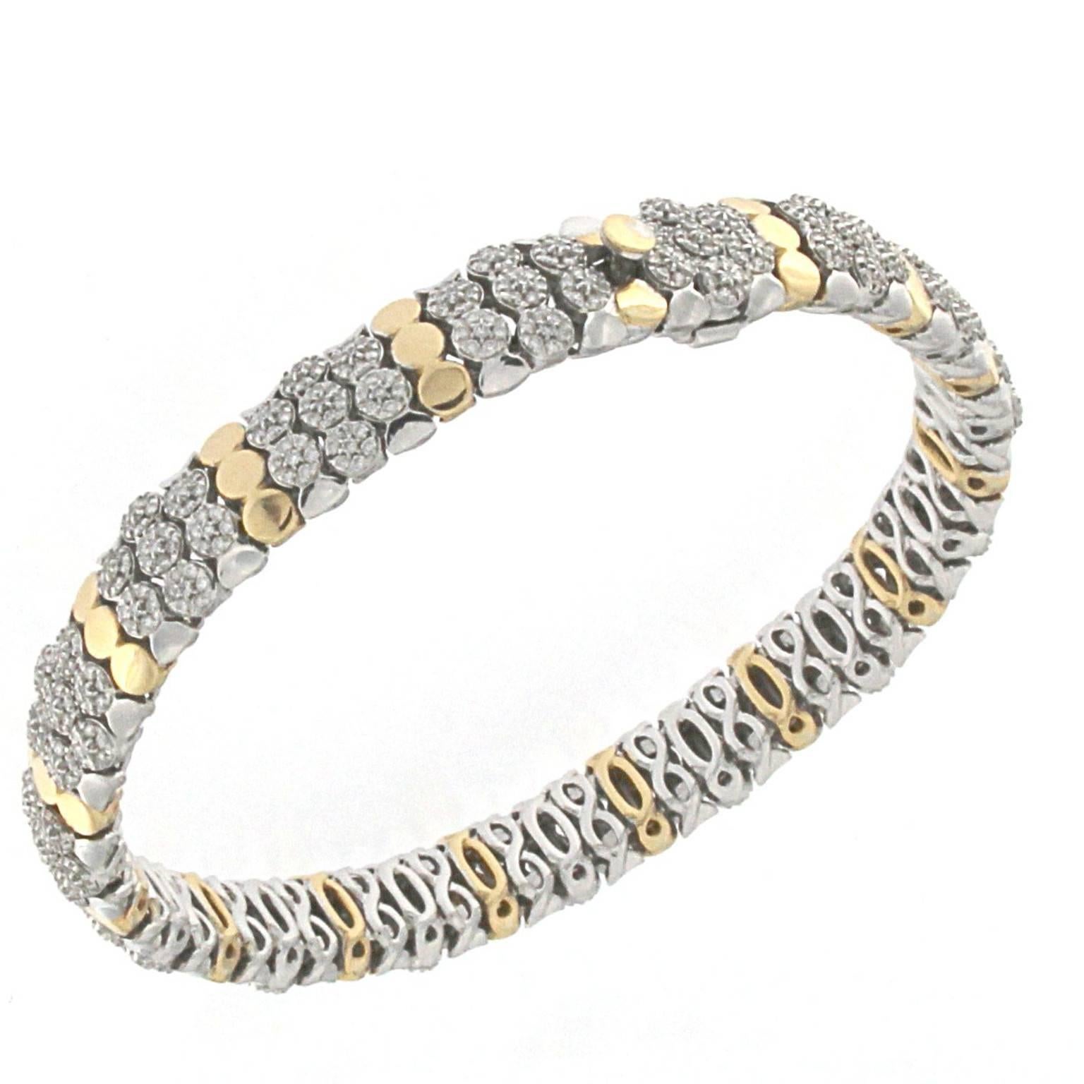 Titti collection bracelet in 18 kt rose gold and white diamonds 

The total lengh is 18.00 cm
the total weight of the gold is 29.30
the total weight of the diamonds is ct 2.25 (color HG clarity VVS1)
STAMP: 10 MI ITALY 750

