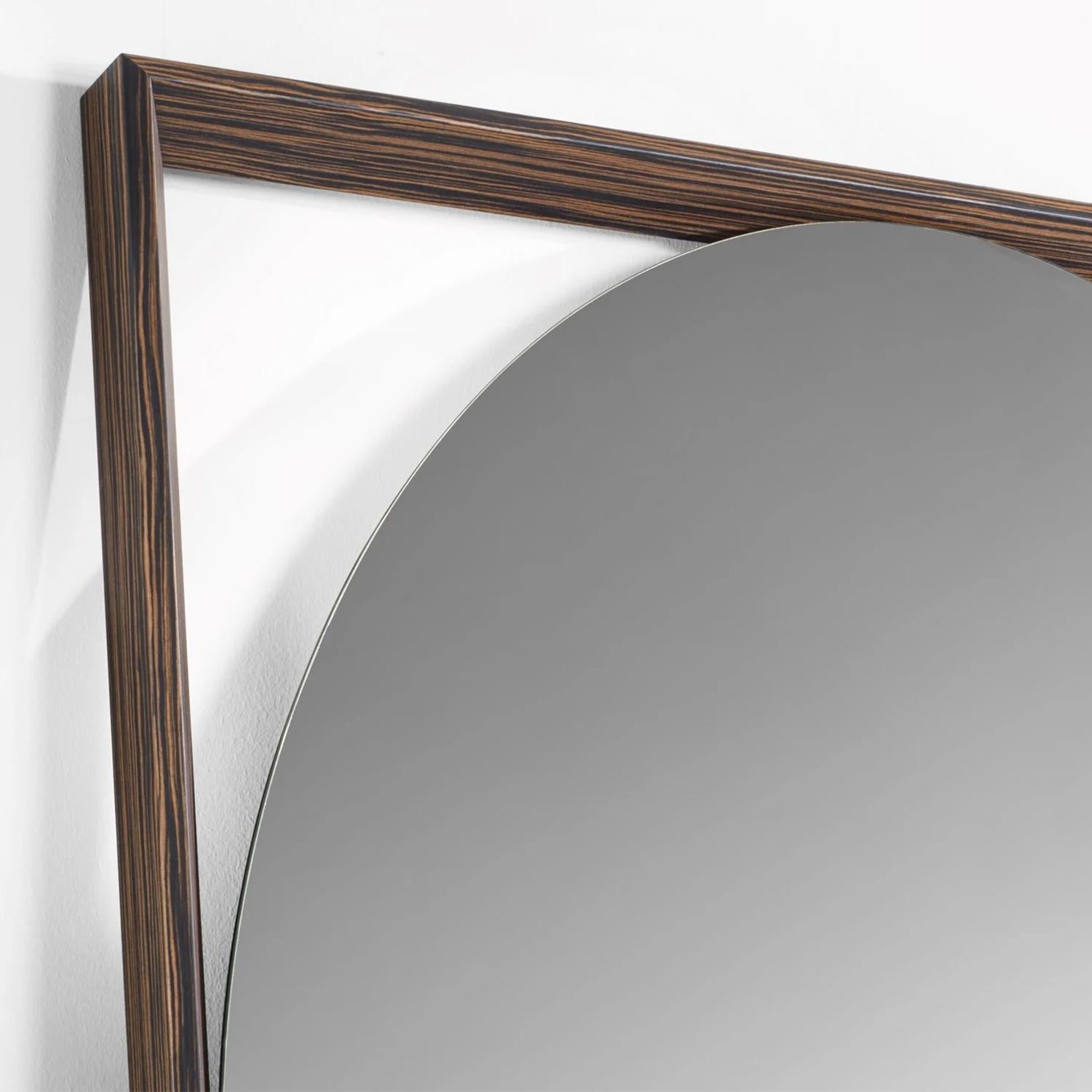 Mirror Loma Gate Stained with solid ash frame in walnut
stained finish. With round mirror glass. Loma Gate Mirror
is a floor mirror or a wall mirror. Also available with frame
in blackened stained finish, on request.