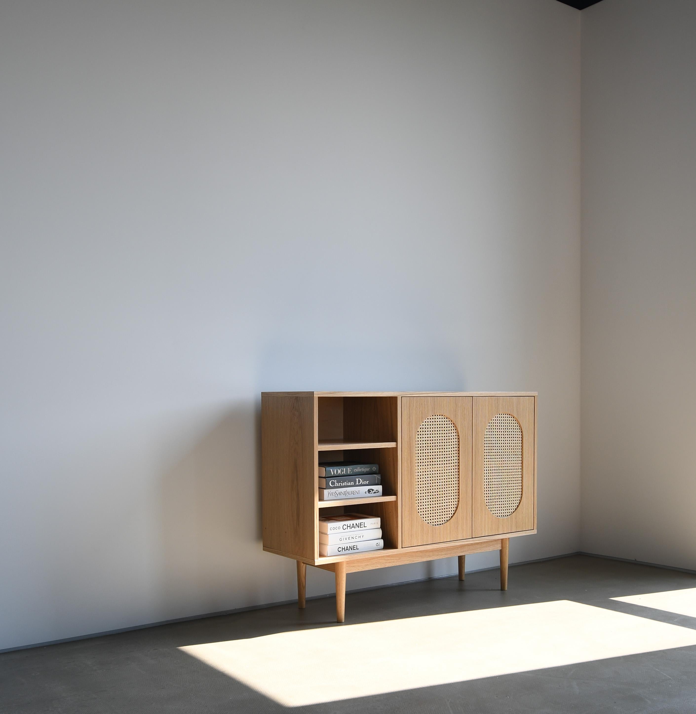 Loma Medium Cabinet by Pastform
Dimensions: D 40 x W 120 x H 90 cm.
Materials: Stained and varnished wood.

Available in different wood color finishes: BPA, Nobel, Brandy, Whiskey, Rum, Natura, Honey, Dark Brown, Nevada, Cognac, and Schwartz.
