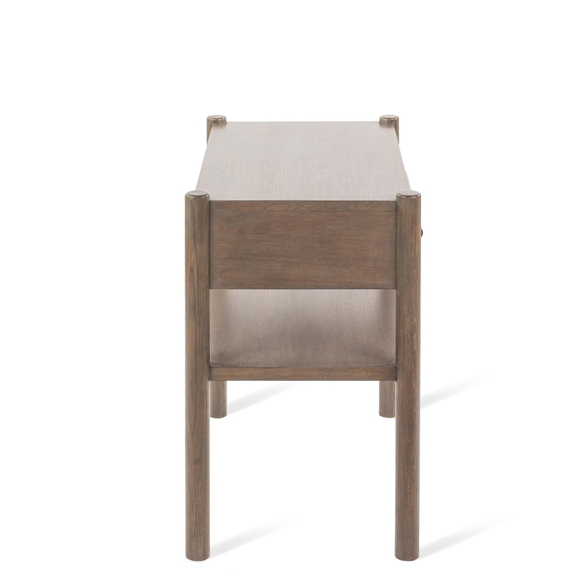 Designed by Josh Greene.
Nightstand with dowel shaped legs and drawer handle.

Also available in a smaller 18 x 18 size. 