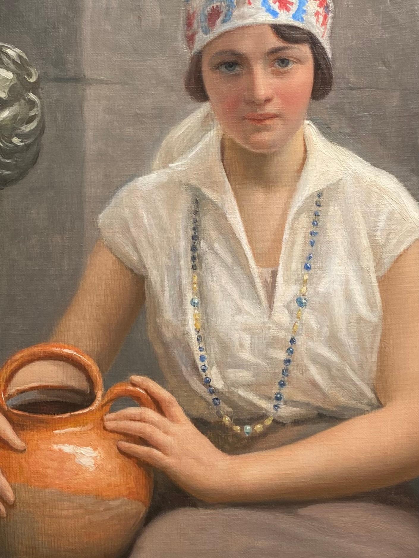 Junges Mädchen mit einem Krug