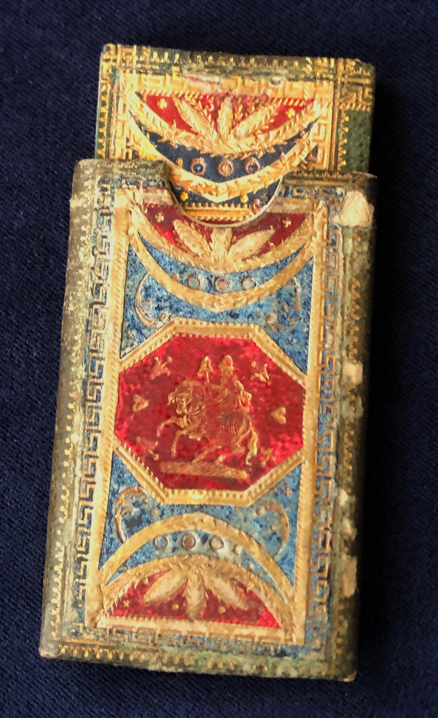 London, 1796. 
64mo, 1 1/4 x 1 3/8 in. (57 x 33 mm), 24pp. Very beautiful publisher's Venetian style mosaic style inlaid morocco in green, red, and blue, with gilt decorations, central medallion with horse and rider; red end-papers, a.e.g. Engraved