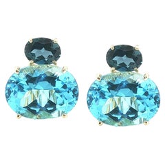 Tansanit & Schweizer Blautopas-Ohrringe aus 18 Karat Gelbgold mit Omega-Rücken