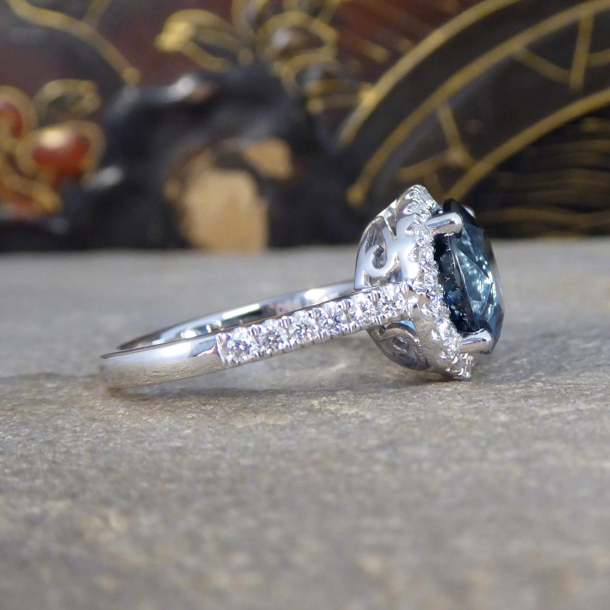 Modern London Blue Topaz and Diamond Halo Cluster Ring in Platinum with Diamond set Sho For Sale