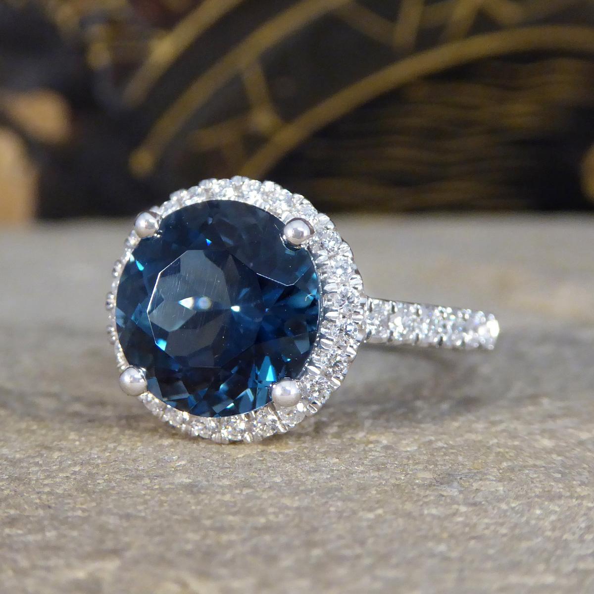 London Blue Topaz and Diamond Halo Cluster Ring in Platinum with Diamond set Sho In New Condition For Sale In Yorkshire, West Yorkshire