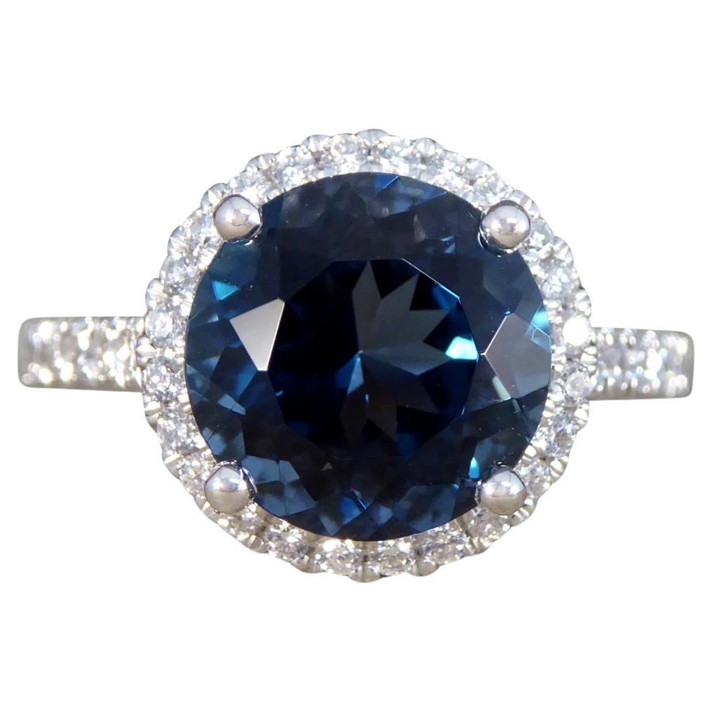 Londoner Blauer Topas und Diamant Halo-Cluster-Ring aus Platin mit Diamantbesatz Sho