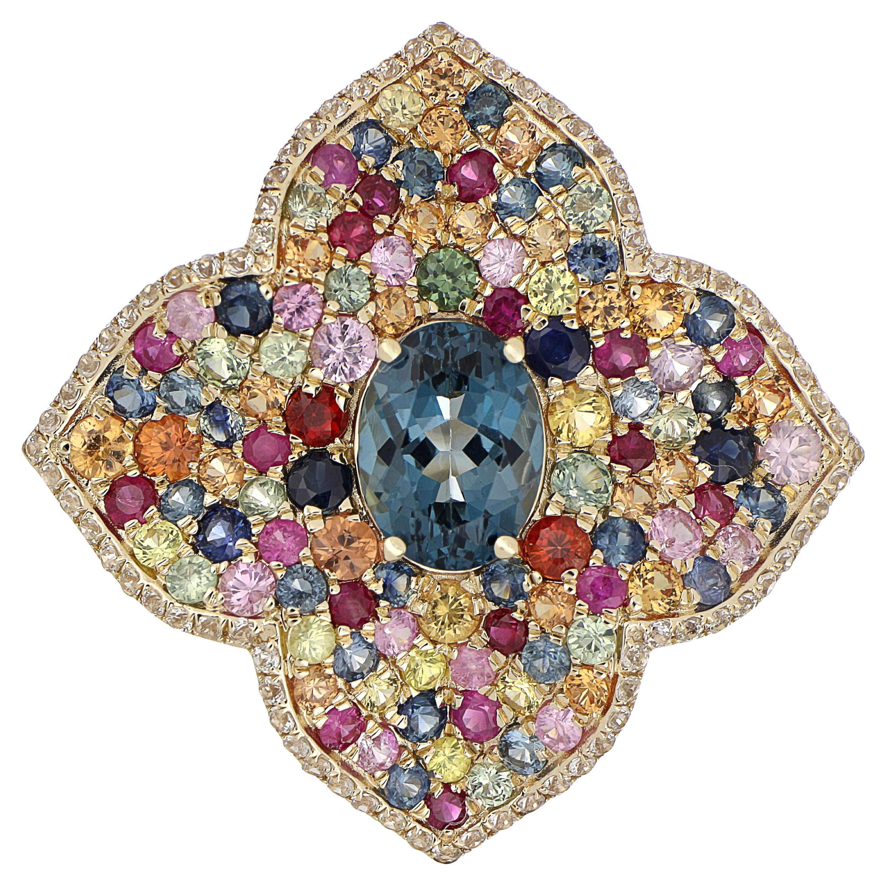 Londoner Nietenring aus 10 Karat Gelbgold mit blauem Topas und mehreren Saphiren