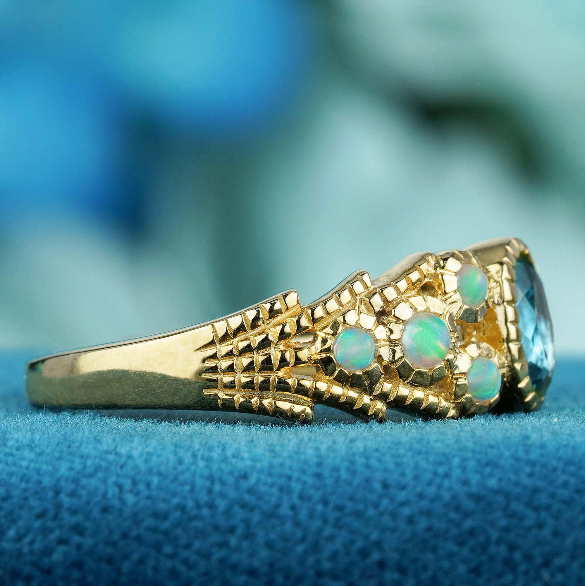 Londoner Vintage-Ring aus massivem 9 Karat Gelbgold mit blauem Topas und Opal im Vintage-Stil (Ovalschliff) im Angebot