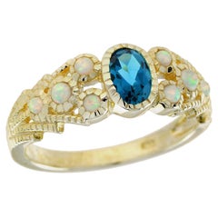 Anello stile vintage con topazio blu di Londra e opale in oro giallo massiccio 9 carati