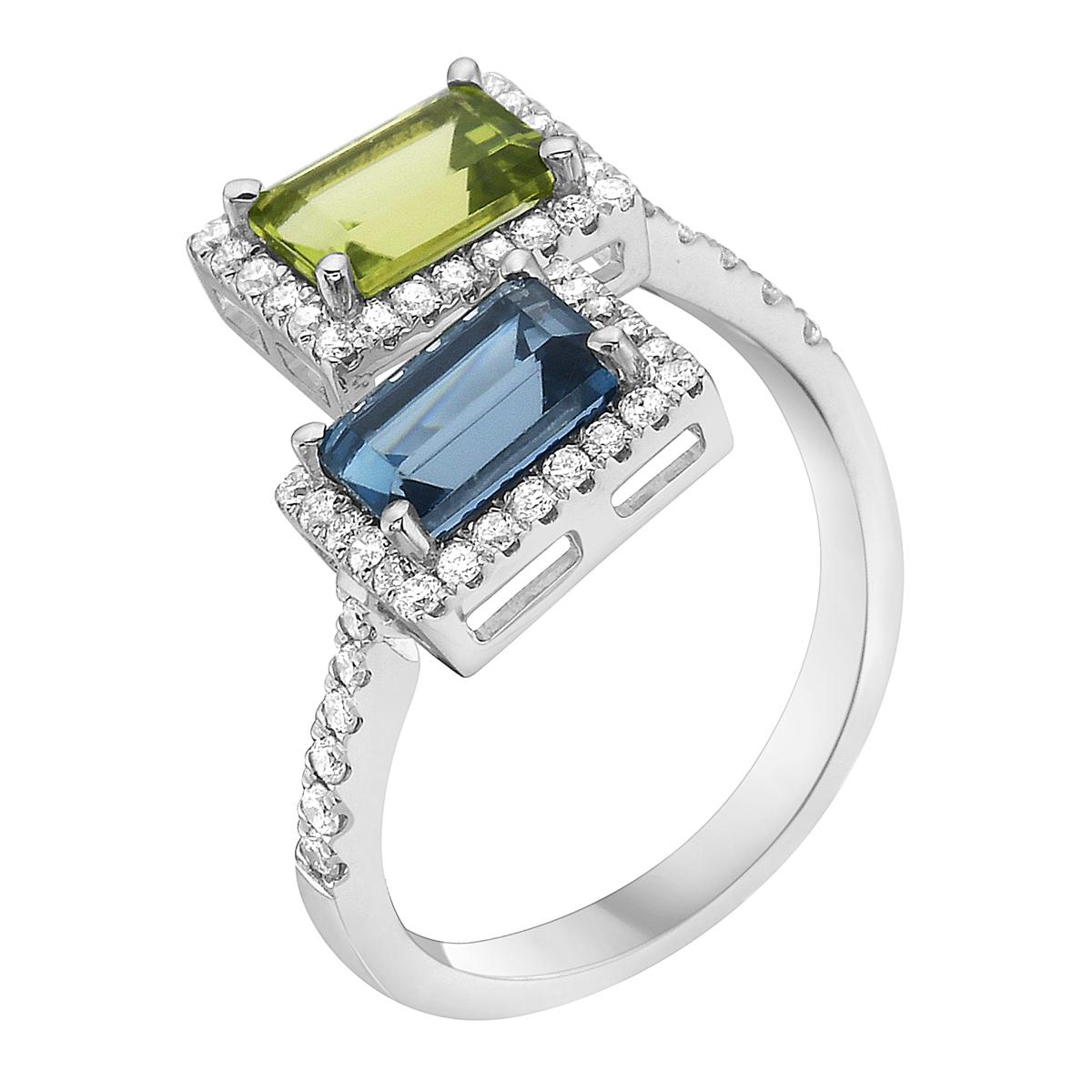 With this exquisite semi-precious London Blue Topaz and Peridot diamond ring, style and glamour are in the spotlight. This 14-karat white gold ring is made from 3.4 grams of gold and one Peridot totaling 1.04 karats as well as one London Blue Topaz
