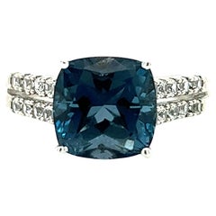 Bague London en or 14 carats avec topaze bleue et saphir blanc