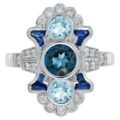 London Blue Topaz Aquamarine Sapphire and Diamond Three Stone Ring in 18k Gold 