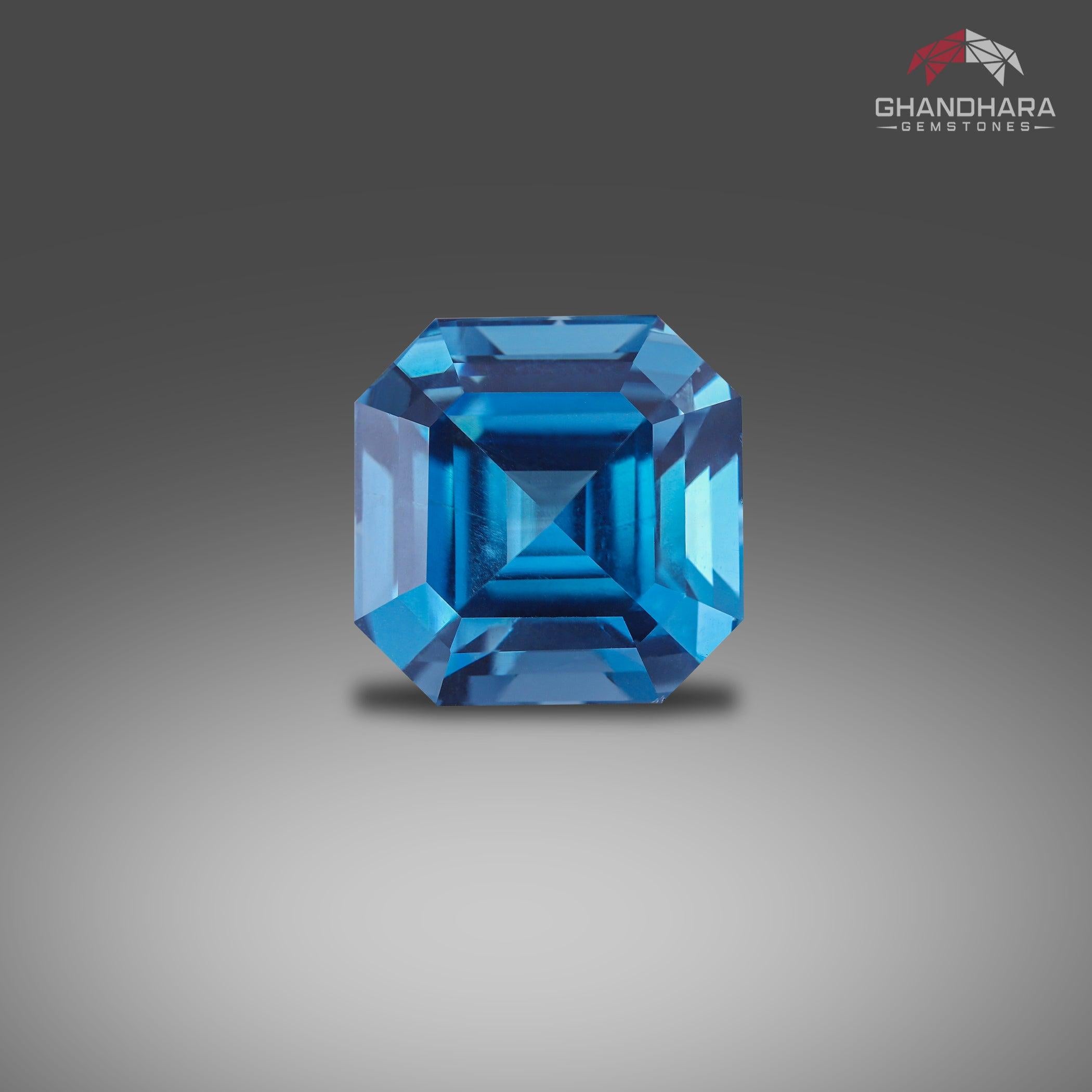 London Blue Topaz Asscher Cut of 16.60 carats from Madagascar has a wonderful cut in a Square shape, incredible Blue color. Great brilliance. This gem is totally Loupe-Clean. 

Product Information:
GEMSTONE NAME:	London Blue Topaz Asscher