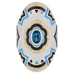 Bague London en or jaune 14 carats avec topaze bleue, saphir bleu, émail et diamants 