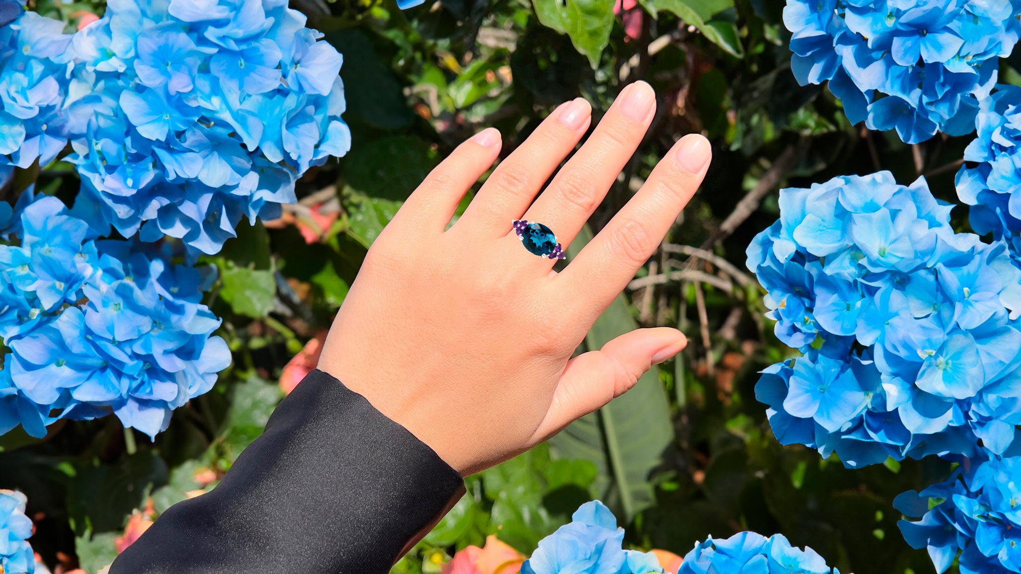 It comes with the Gemological Appraisal by GIA GG/AJP
All Gemstones are Natural
London Blue Topaz = 6.05 Carats
6 Amethysts= 0.60 Carats
Metal: Rhodium Plated Sterling Silver
Ring Size: 8* US
*It can be resized complimentary