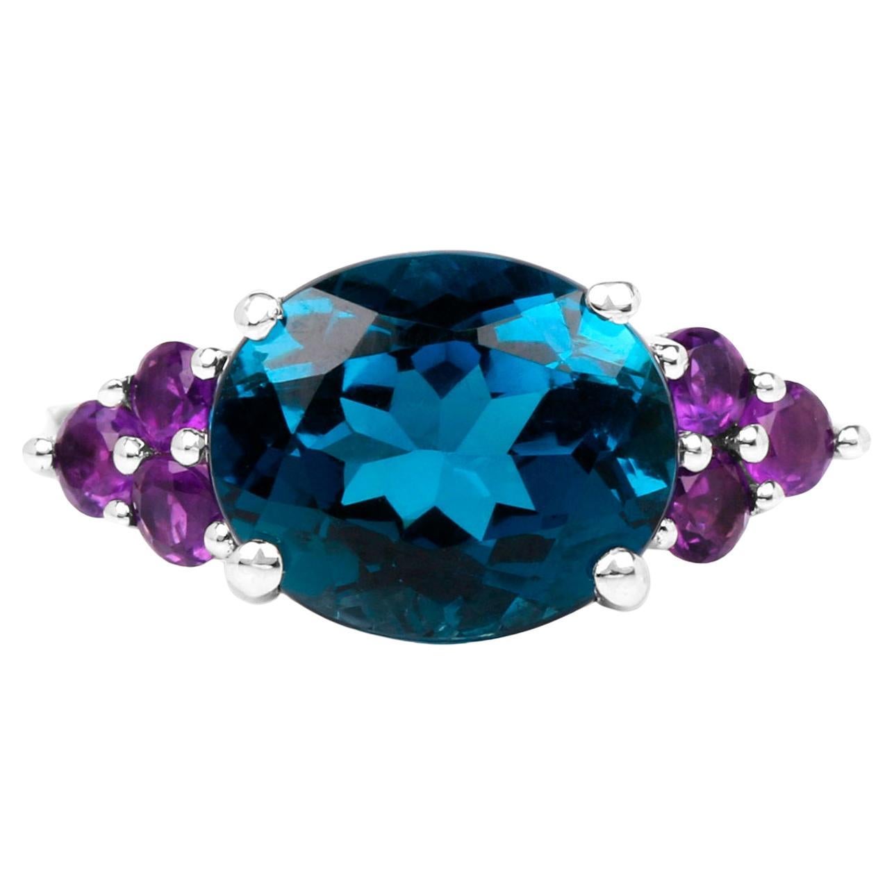 London Blue Topaz Cocktail Ring Amethyst Setting 6.65 Carats For Sale