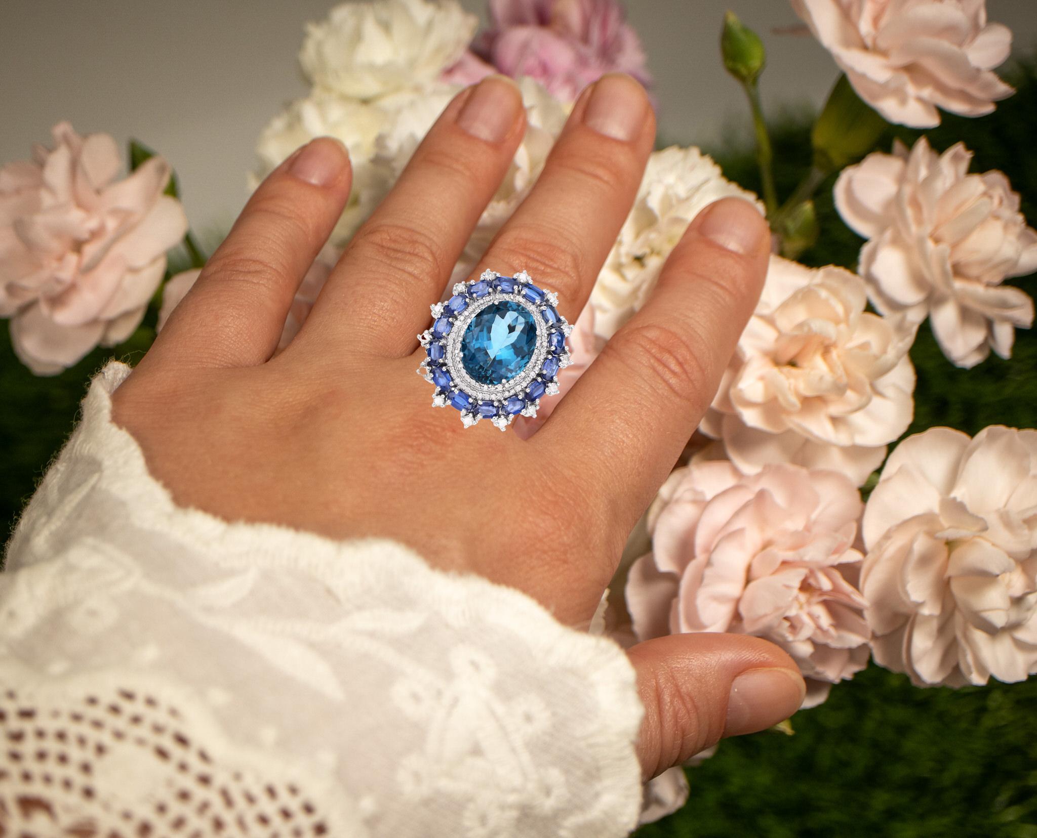 It comes with the appraisal by GIA GG/AJP
All Gemstones are Natural
London Blue Topaz = 15.50 Carat
14 Kyanites = 4.40 Carats
98 Diamonds = 1.10 Carats
Metal: Rhodium Plated Sterling Silver
Ring Size: 6.5* US
*It can be resized complimentary
