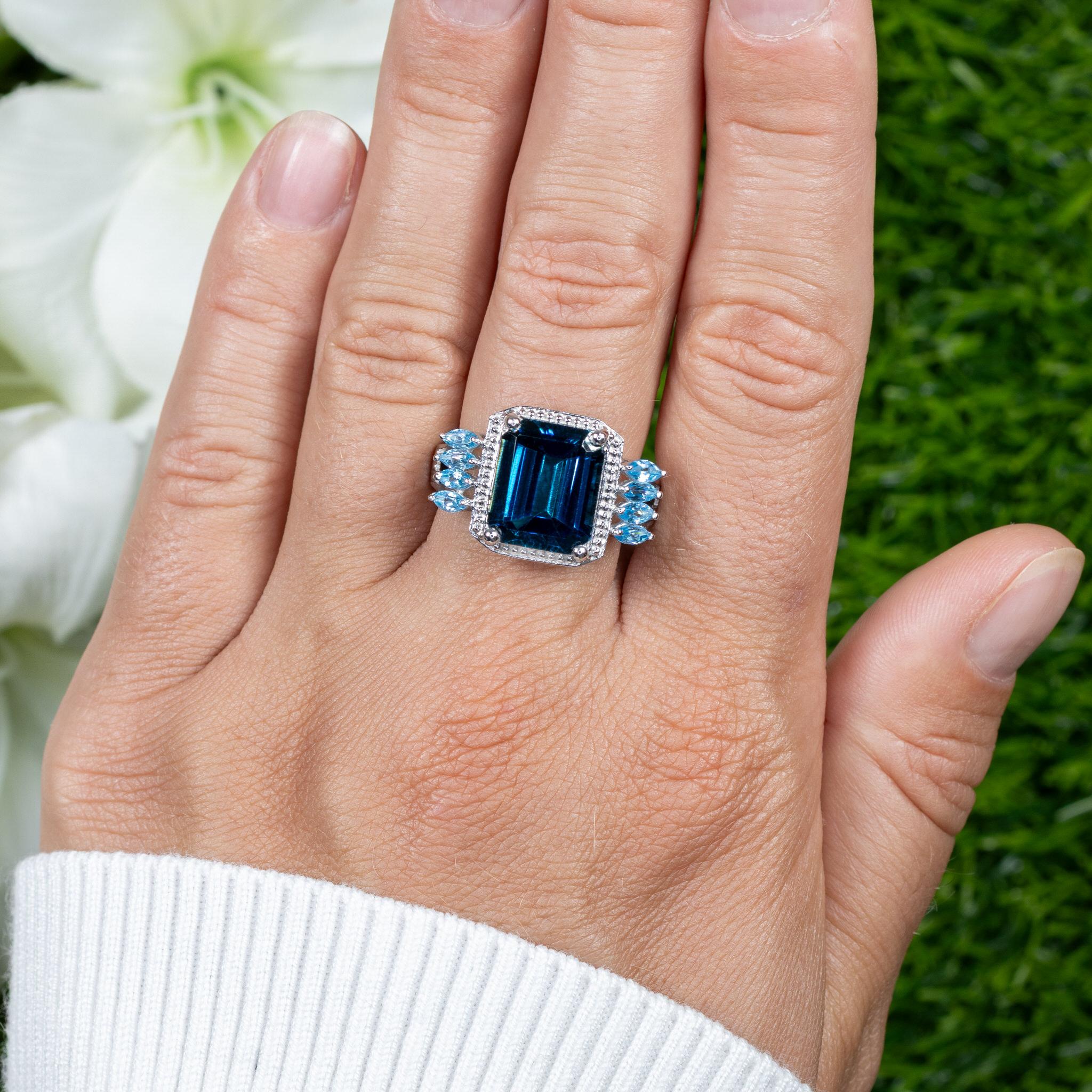It comes with the Gemological Appraisal by GIA GG/AJP
All Gemstones are Natural
London Blue Topaz = 7.50 Carat
8 Swiss Blue Topazes = 0.75 Carats
Metal: Rhodium Plated Sterling Silver
Ring Size: 9* US
*It can be resized complimentary