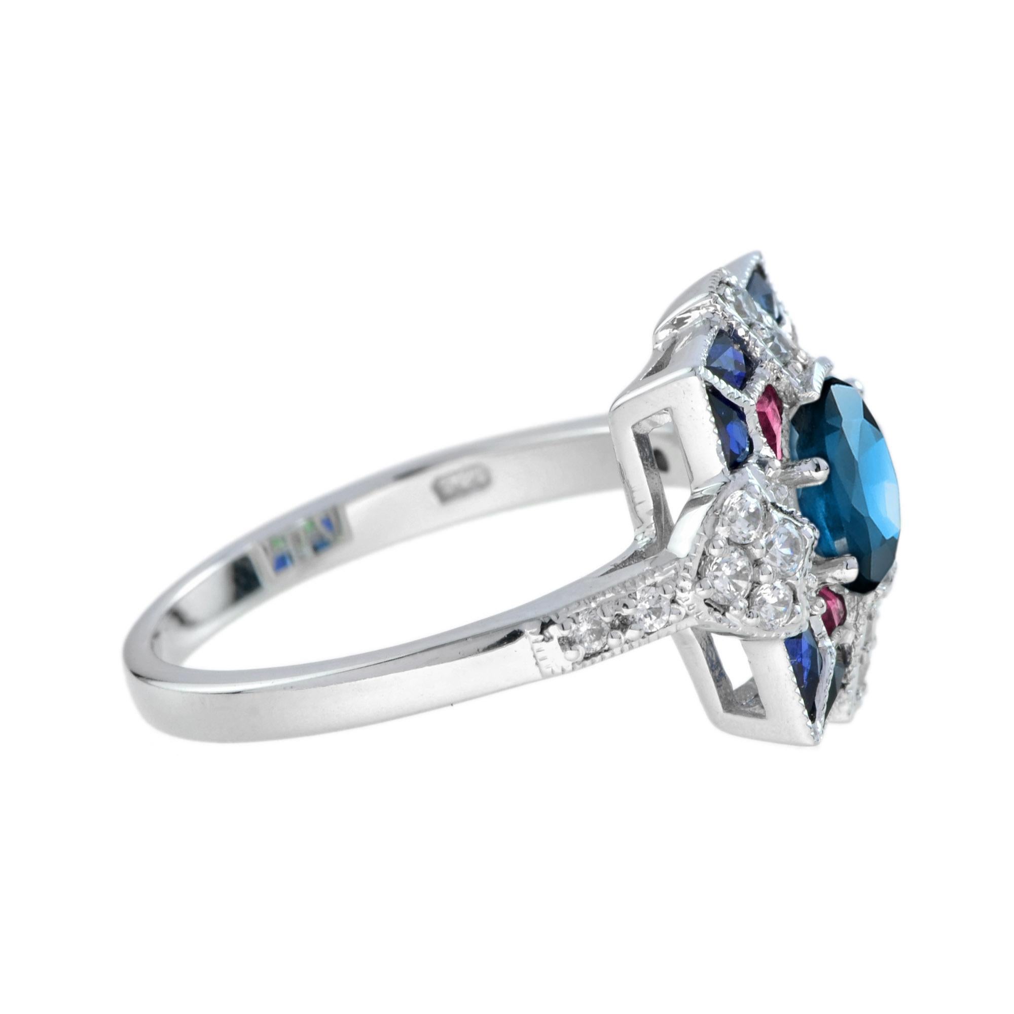 blue topaz and ruby ring
