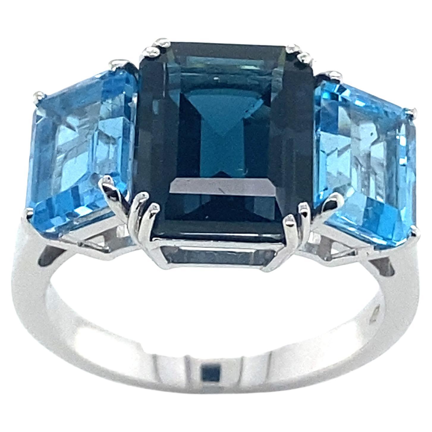 London Blue Topaz Emerald Cut Gold 18 Carats Ring For Sale