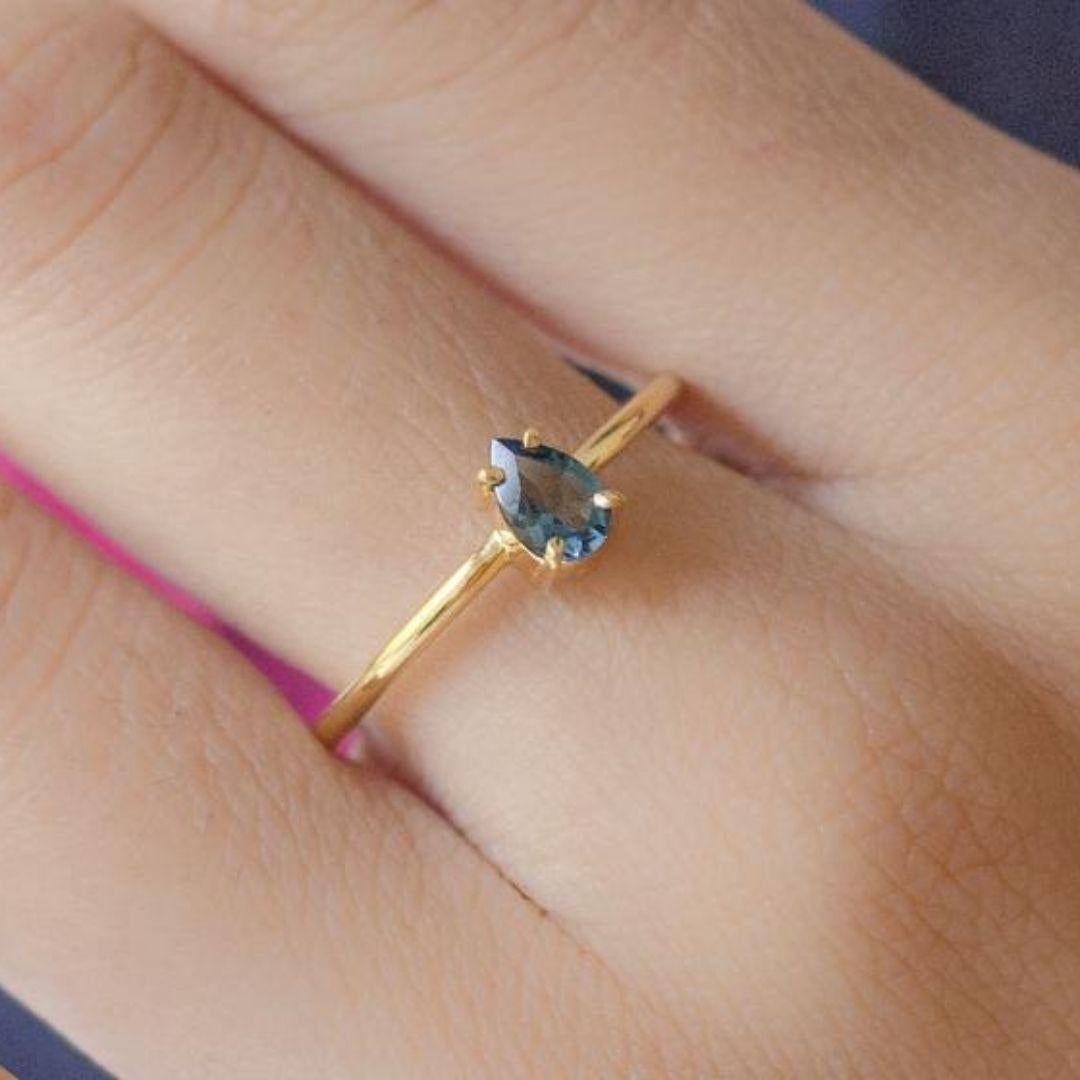 Handmade item
Materials: Gold, Rose gold, White gold
Gemstone: Topaz
Gem color: Blue
Band Color: Gold
Style: Minimalist

London blue topaz teardrop shape gold ring. Perfect engagement ring with the blue gemstone. Pear-shaped single stone ring,