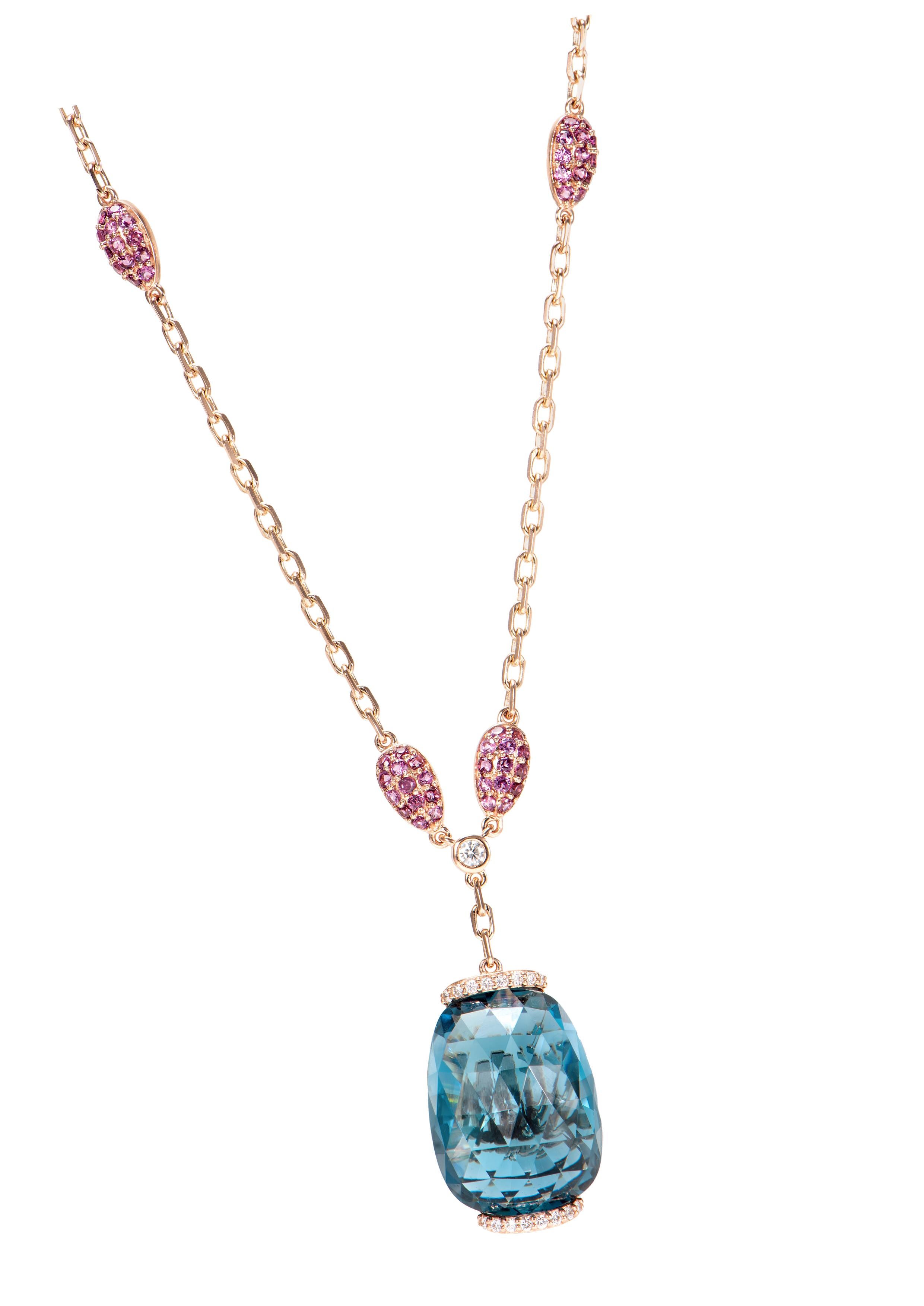 An exclusive collection of designer and unique Pendant by Sunita Nahata Fine Design.
Accented with diamonds these Pendants are made in Rose gold and present a classic yet elegant look. 

London Blue Topaz Pendant with Rhodolite and White Diamond in