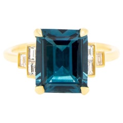 Bague London Bague en or jaune 18 carats sertie d'une topaze bleue sertie de diamants 4 carats