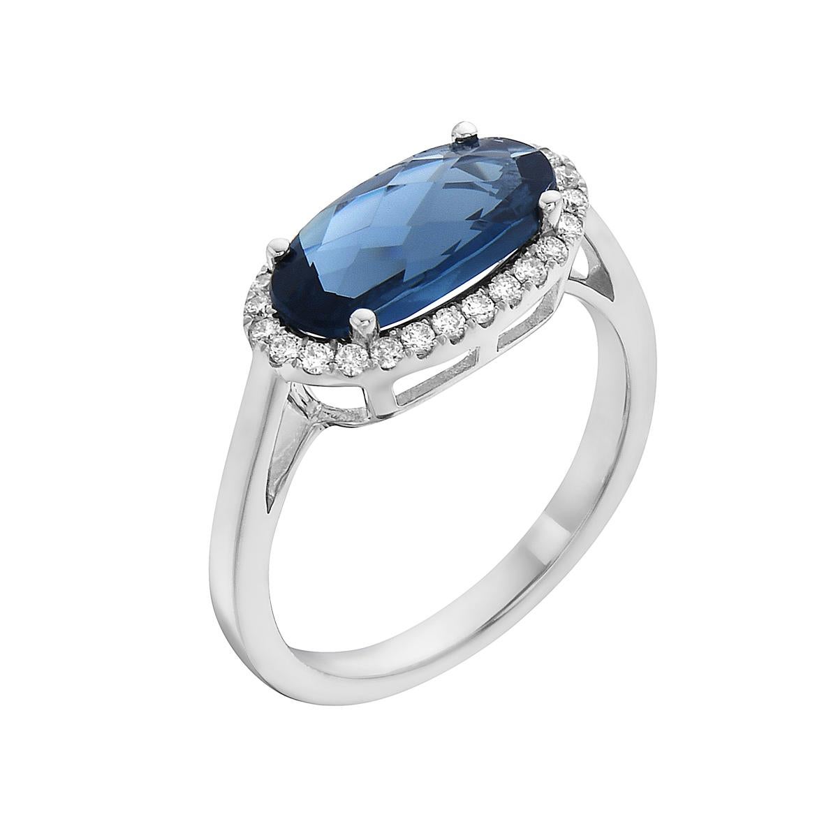 With this exquisite semi-precious London blue topaz ring, style and glamour are in the spotlight. This 14-karat oval cut ring is made from 2.8 grams of gold, 1 london blue topaz totaling 2.12 karats, and is surrounded by 26 round SI1-SI2, GH color