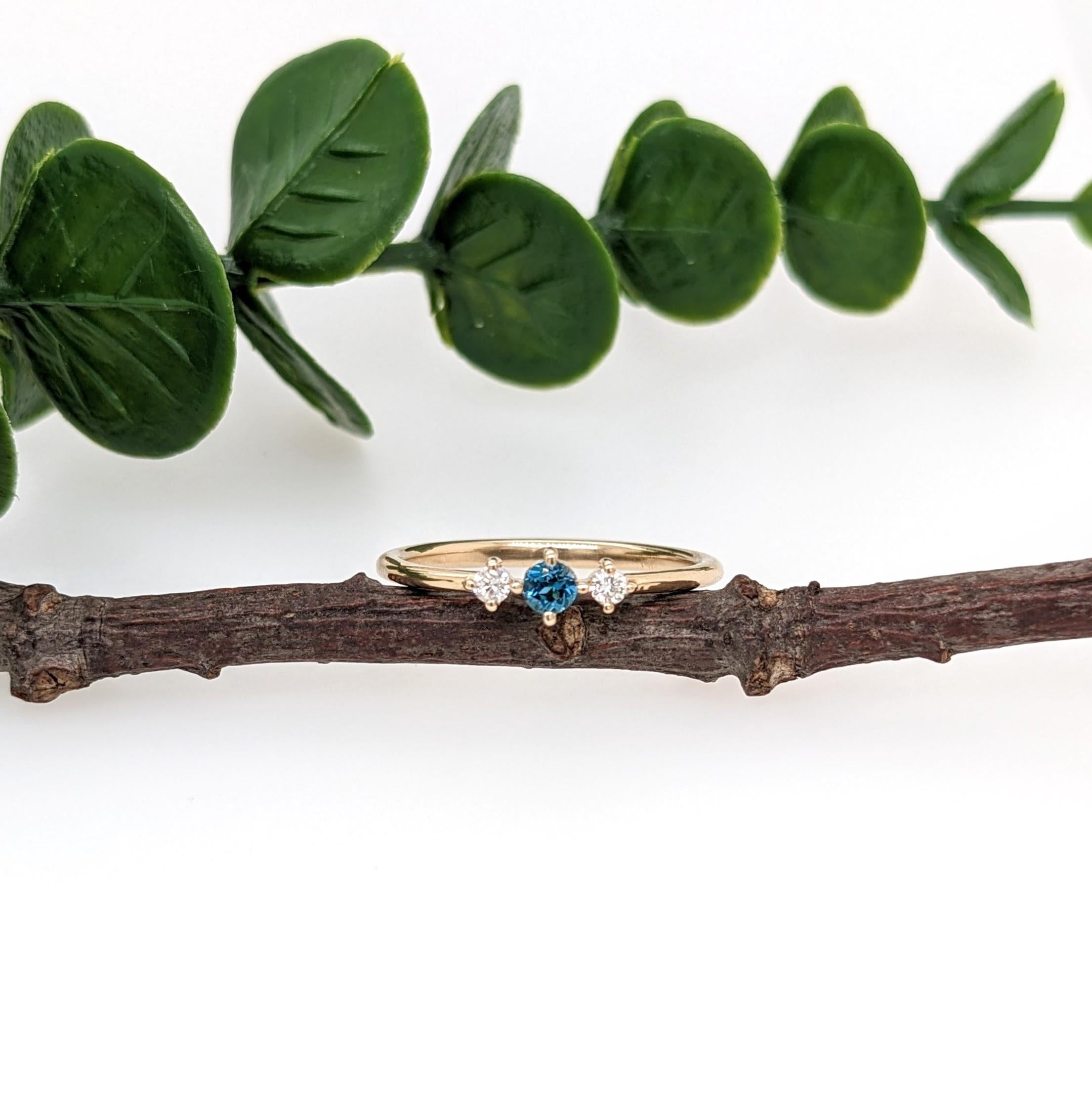This beautiful ring features a Blue Topaz in 14k yellow Gold and two diamond accents. A dainty ring design perfect for an eye catching engagement or anniversary. This ring also makes a beautiful birthstone ring for your loved ones.

The occasions to