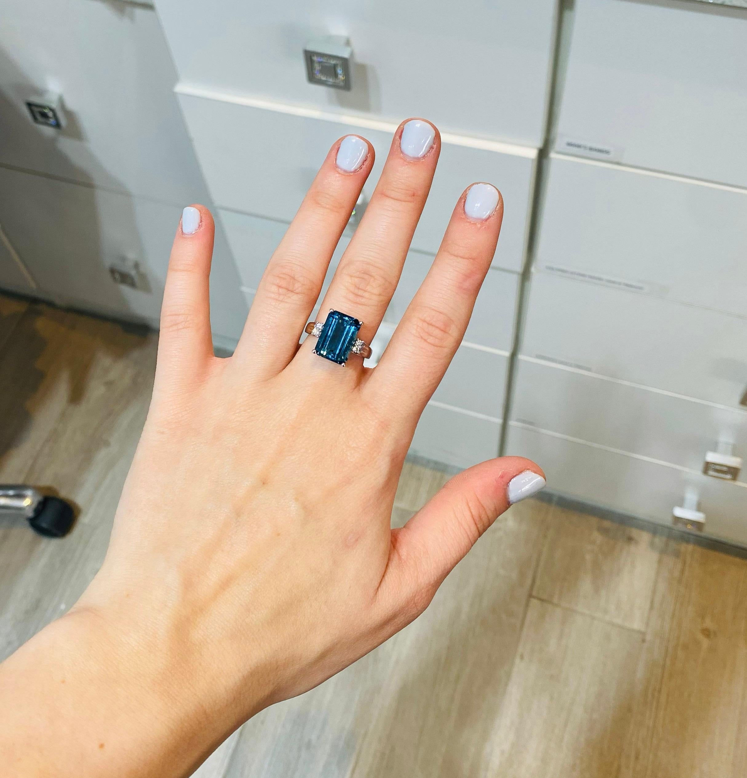 Contemporary London Blue Topaz Ring with Diamond Embellishments Set in 14 Karat White Gold
