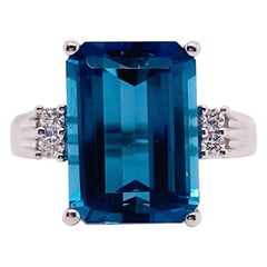 London Blue Topaz Ring with Diamond Embellishments Set in 14 Karat White Gold