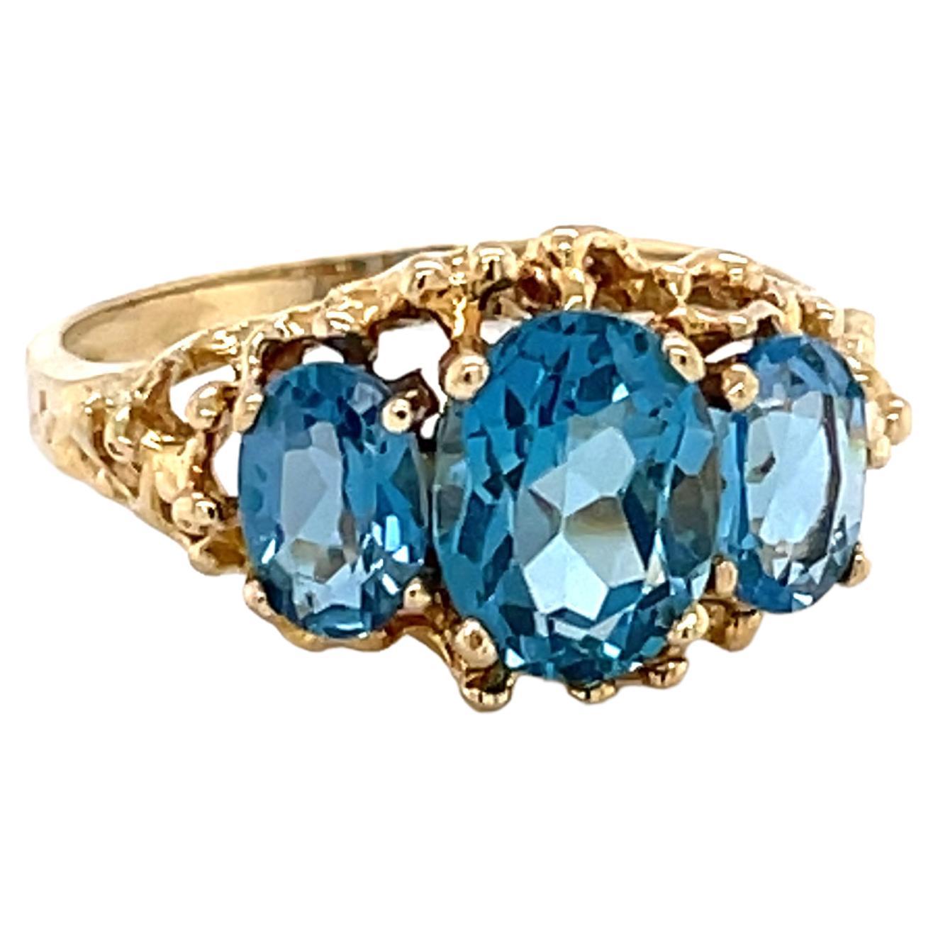 London Blue Topaz Three Stone 10 Karat Yellow Gold Ring