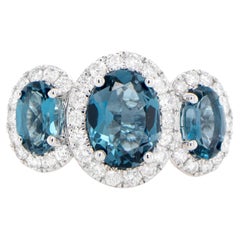 London Blue Topaz Three Stone Ring Diamond Setting 3.92 Carats 18K Gold