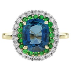 Londoner Blautopas-Tsavorit und Diamant-Doppelhalo-Ring aus 18 Karat Gelbgold