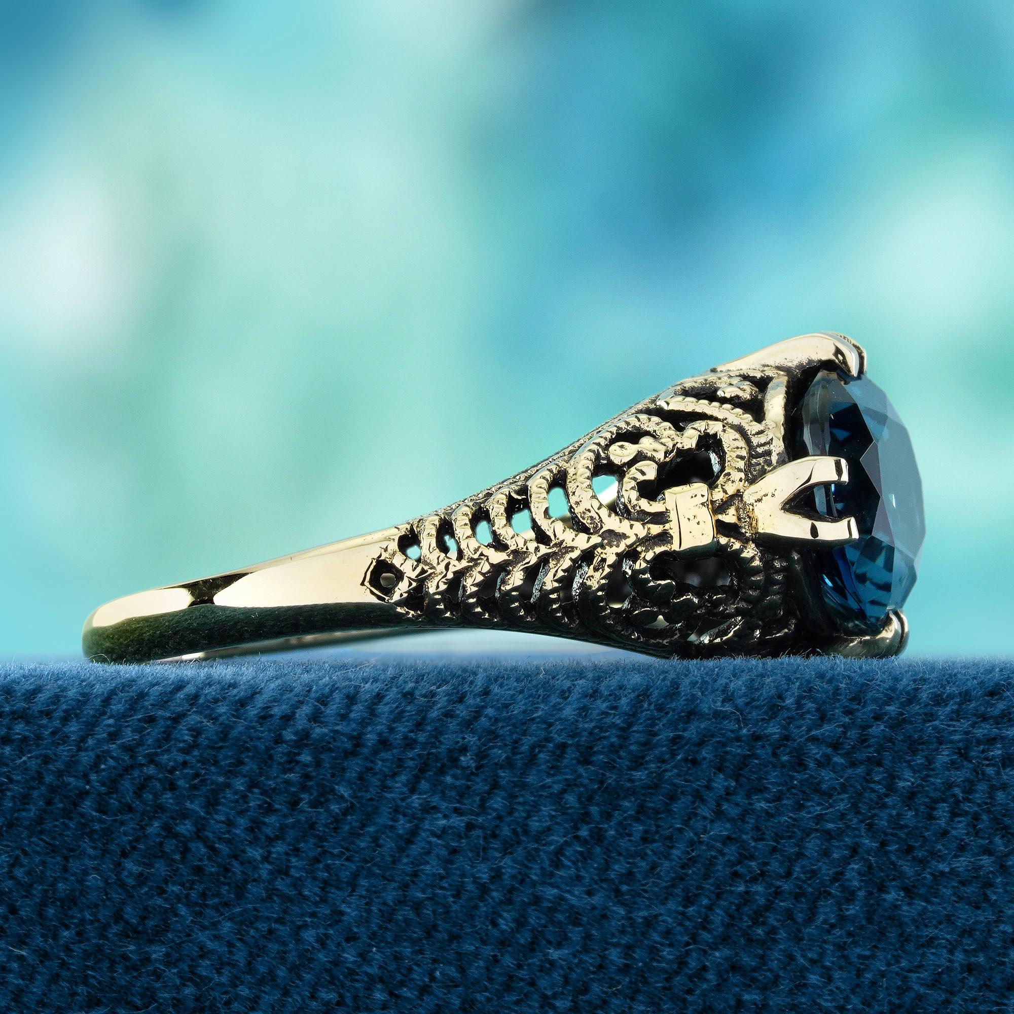 Oval Cut London Blue Topaz Vintage Style Filigree Ring in Solid 9K Yellow Gold For Sale