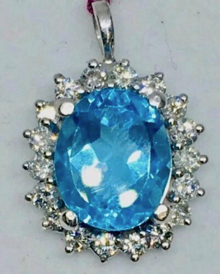 Beautiful 14k White Gold 1.00 Carat G-H VS/SI1 Diamond Blue Topaz Pendant for Necklace

This gorgeous 14k gold vintage estate piece is in excellent condition and features a beautiful 3 carat London Blue Topaz gemstone surrounded in a lovely diamond