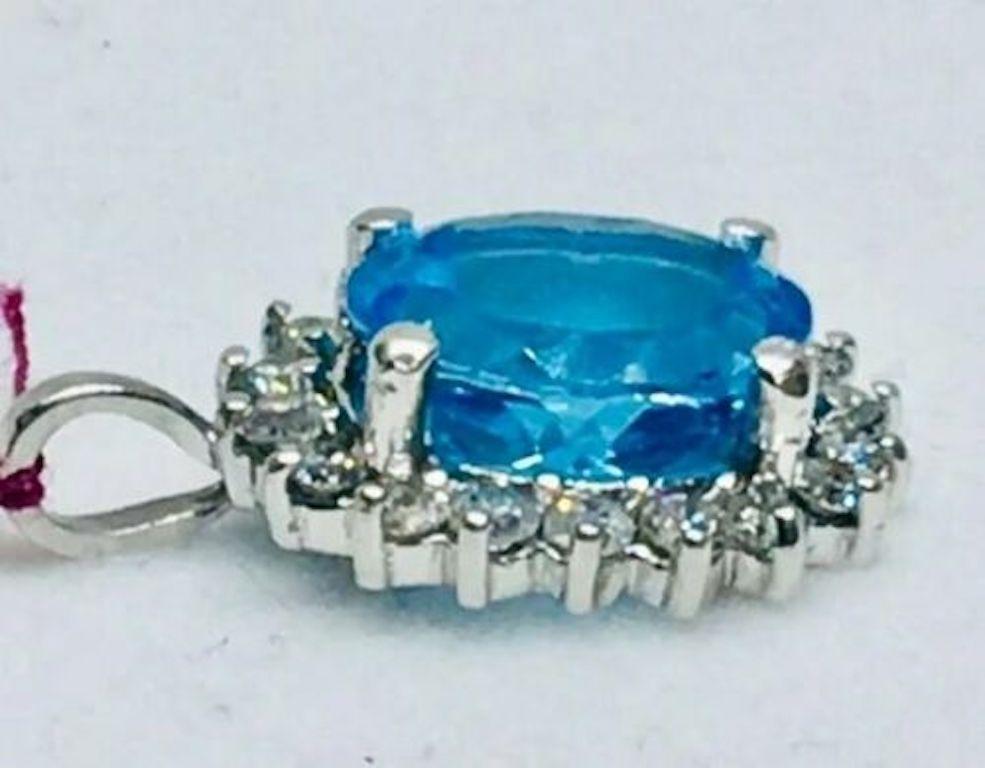 Modern London Blue Topaz VS Diamond Halo Necklace Pendant For Sale