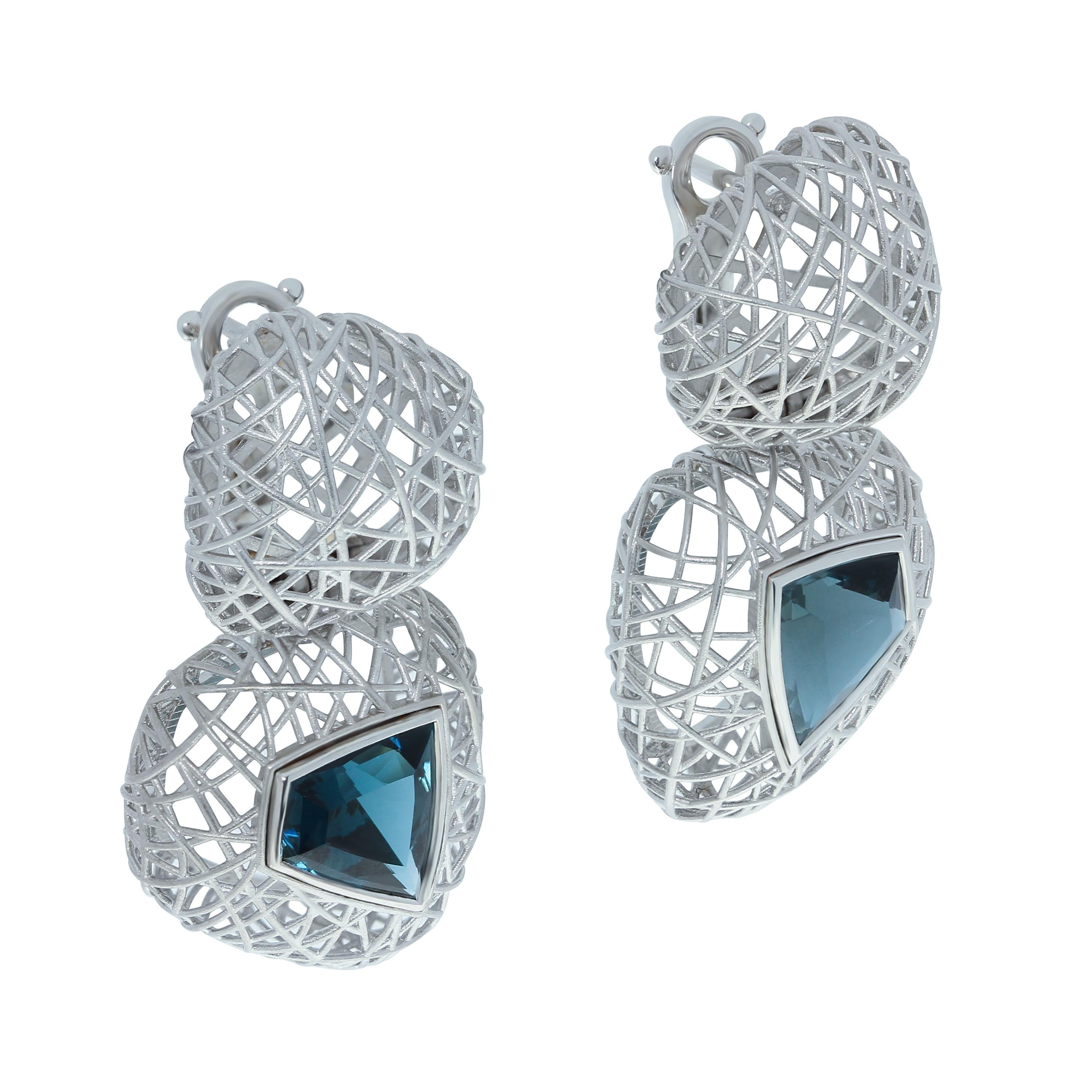 London Topaz 5.05 Carat 18 Karat White Gold Rolling Stone Earrings
We all know about Western films, where rolling stones are moving all the time in the desert. Our collection is inspired by this amazing plant. Thin 