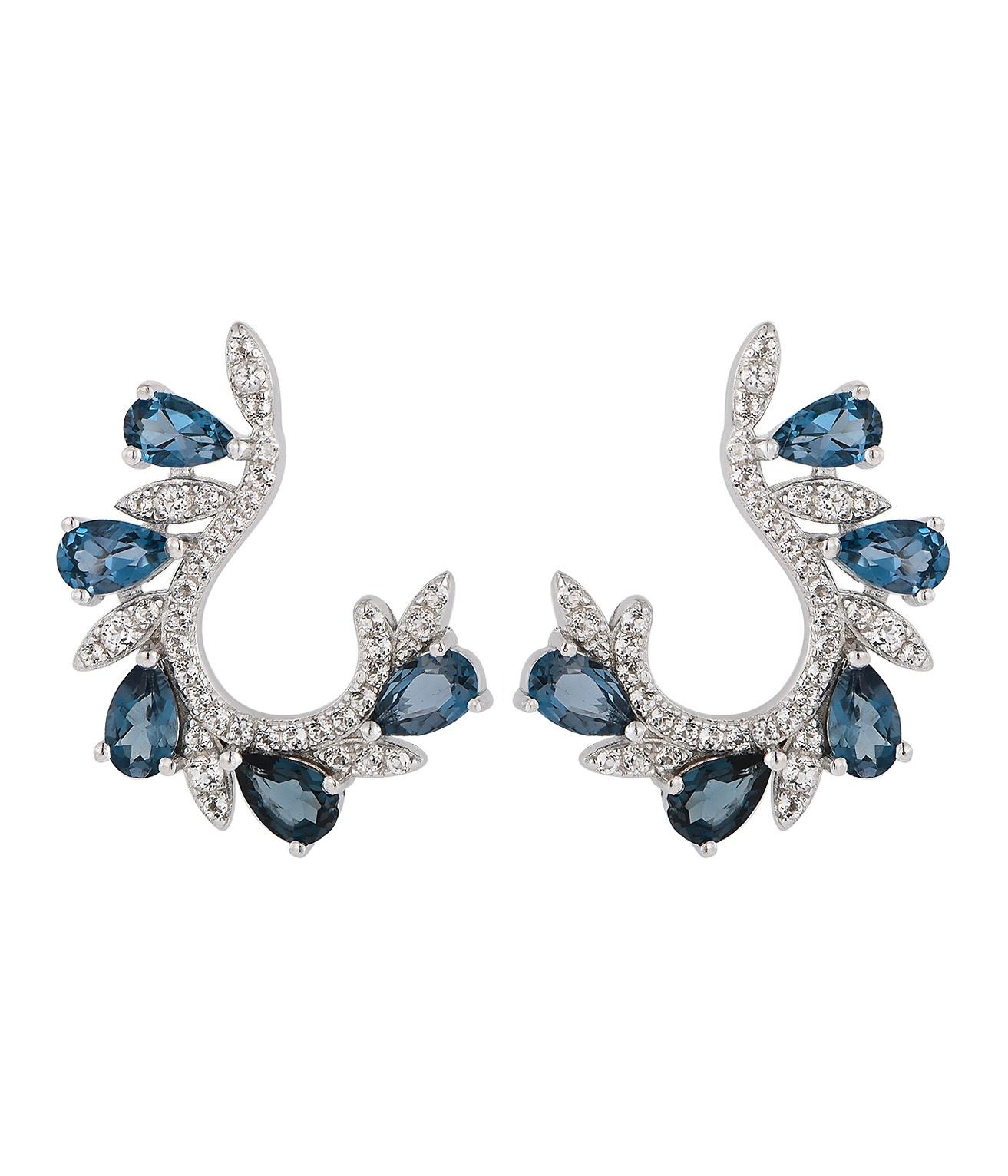 Natural London Topaz: Pear shape, size 3x5mm

Natural White Topaz: Round shape, sizes 1.00 to 1.5mm

925 Silver with Rhodium plated

These elegant earrings feature a stunning combination of natural gemstones and fine craftsmanship. The focal point