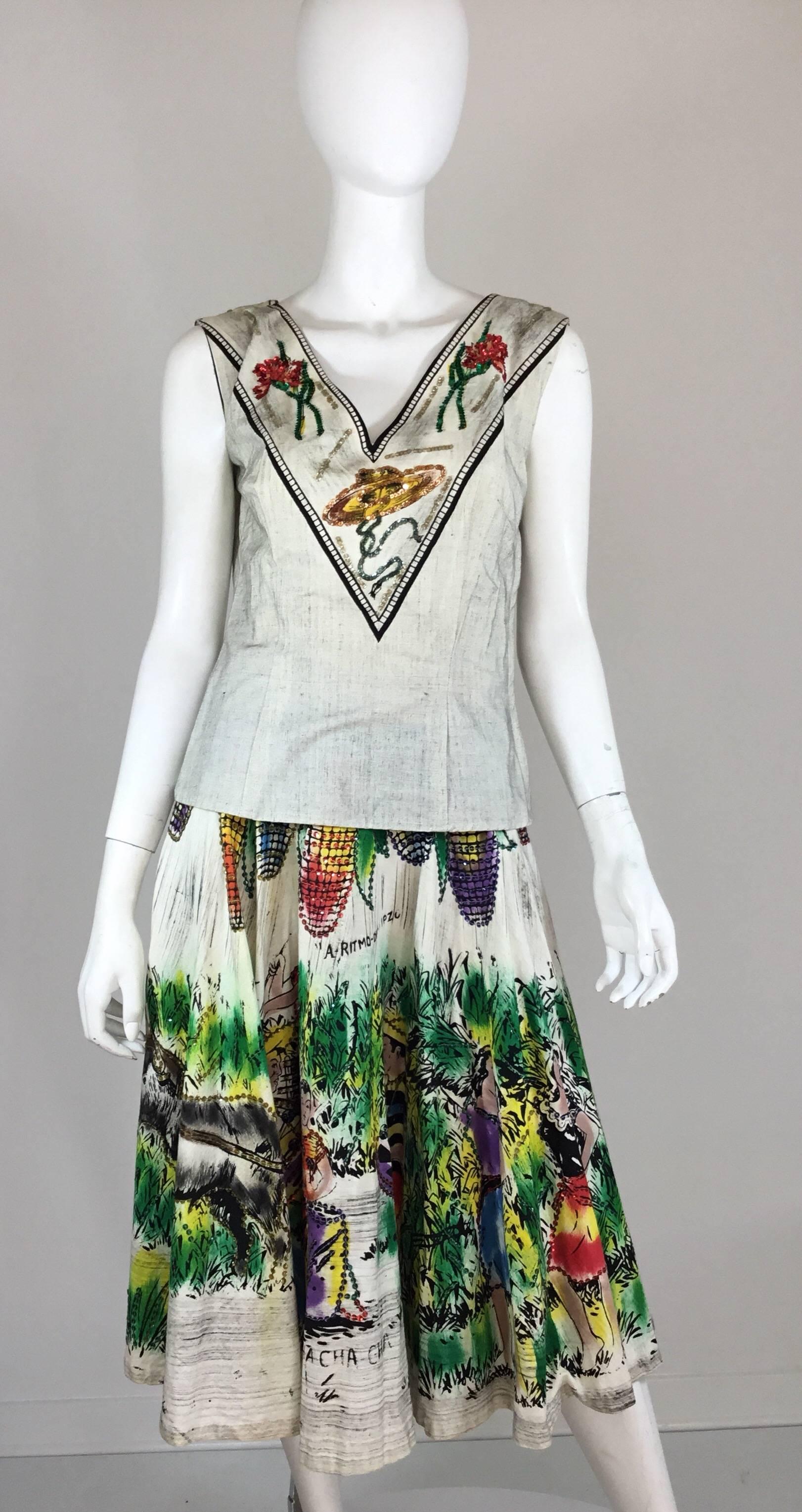 A Ritmo de Calypso, Calypso, Musicians, Londy of Mexico 1950s Mexican tourista hand painted and sequins embellished circle skirt and matching top. Made from hand-painted cotton with sequin detailing. Top has a V-neckline and a metal side zipper