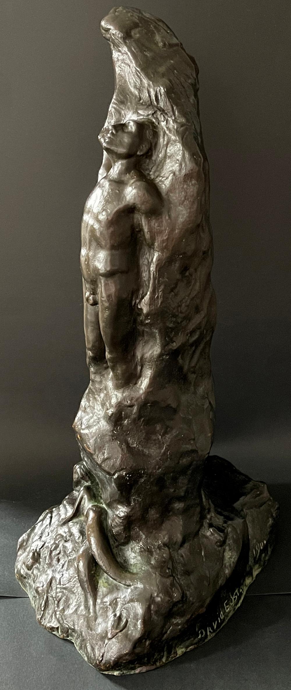 hand statue over cliff