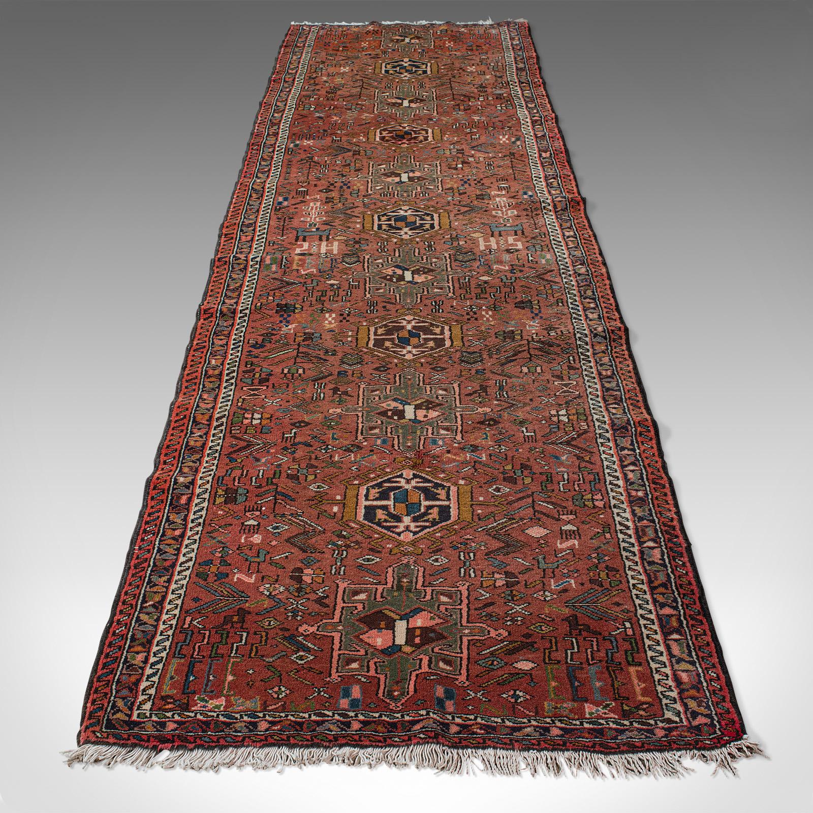 This is a long vintage Karajar runner. A Persian, woven entrance hall carpet, dating to the early 20th century, circa 1930.

Of great length for the hallway at 105cm x 395cm (41.25