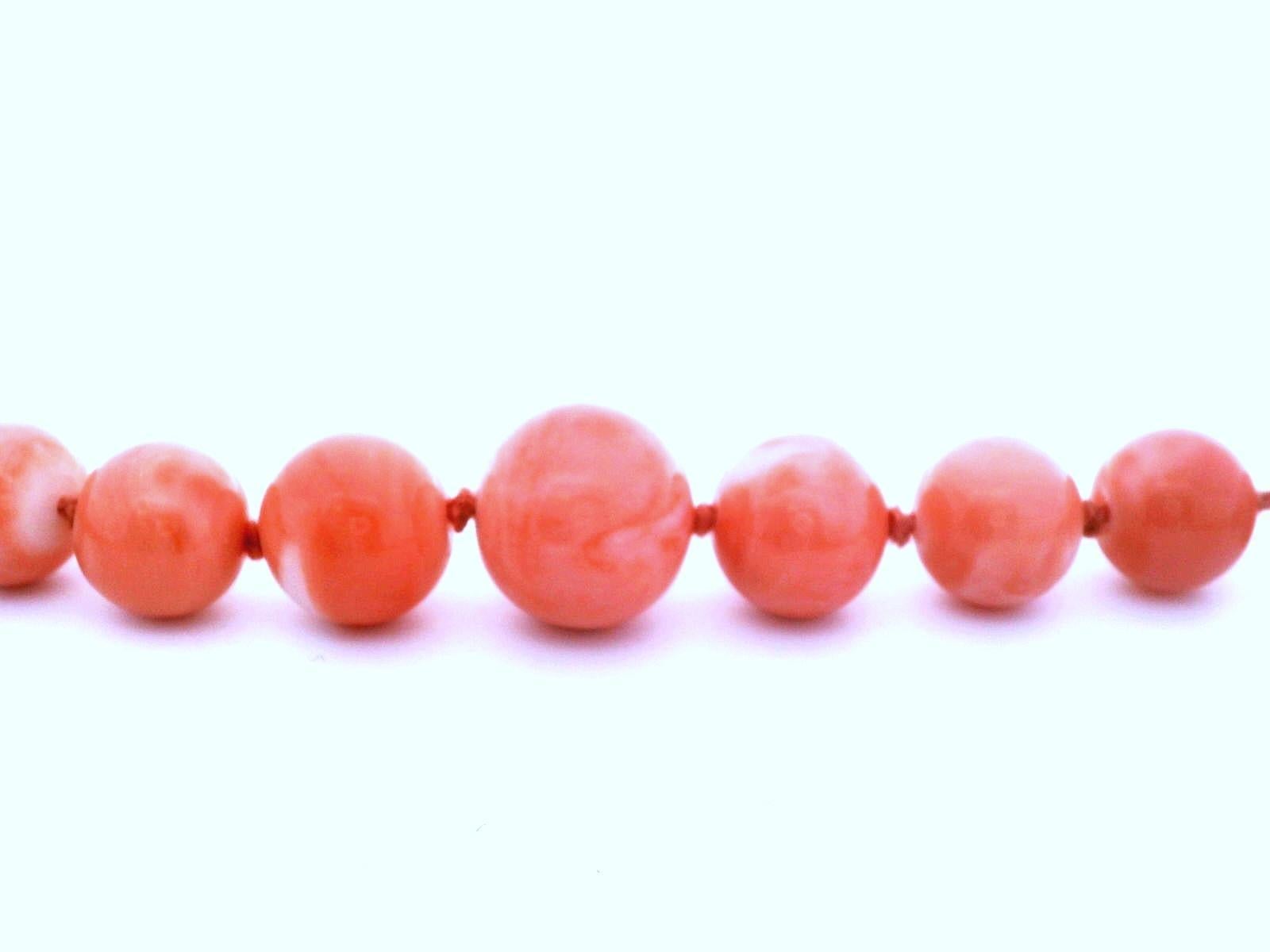 Round Cut Long 18k Yellow Gold Graduating Coral Bead Necklace For Sale