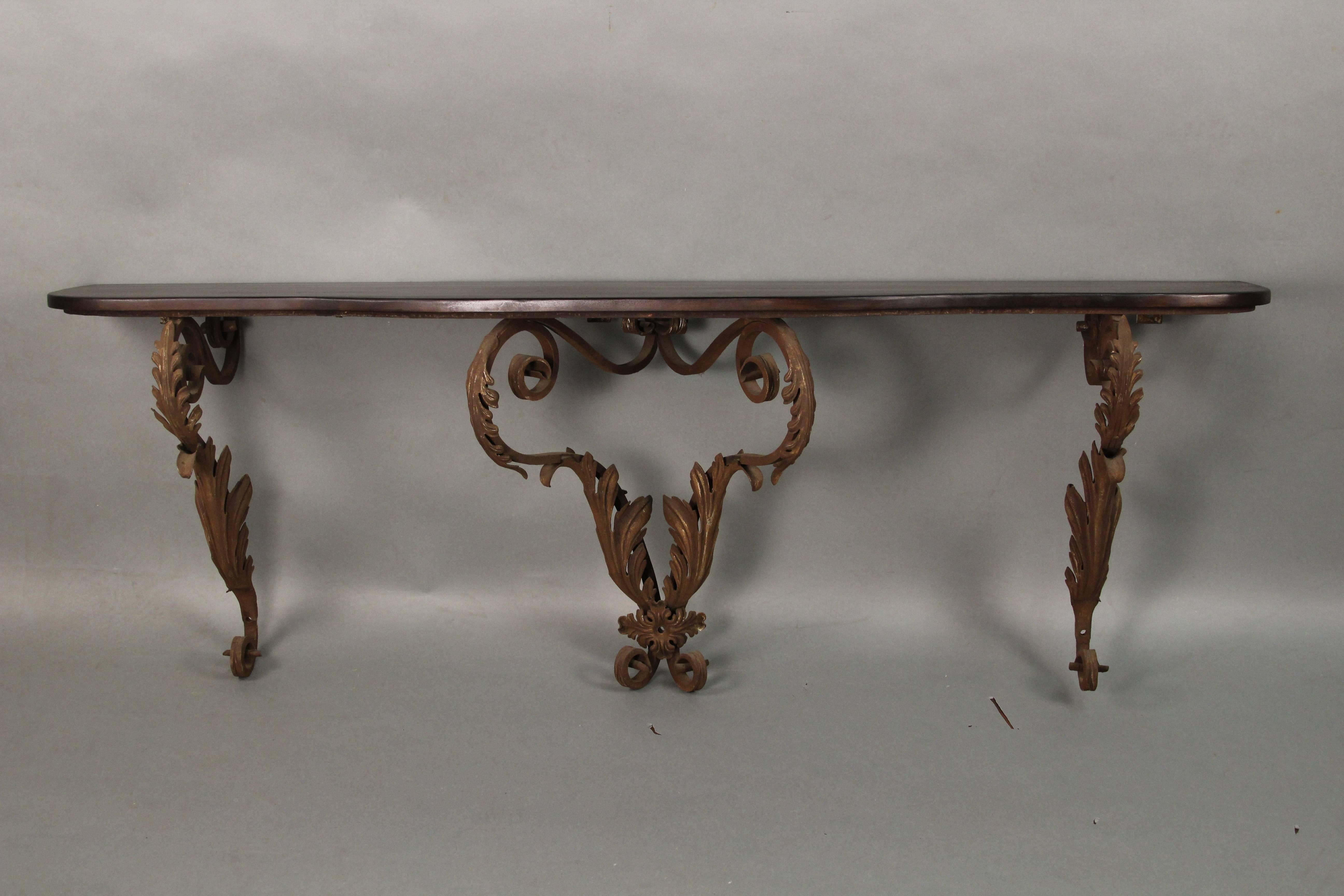 Long and shallow Spanish Revival wall-mounted console table. Very hard to find. From local Santa Monica estate.