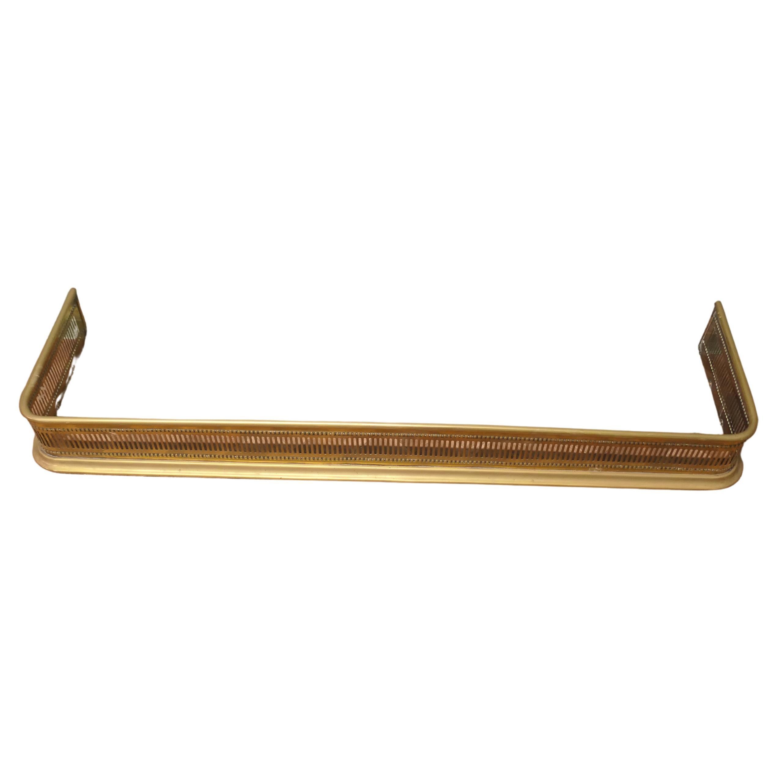 Long 19th Century Pierced Brass Fender