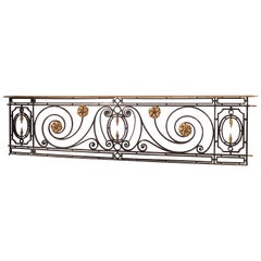 Long 19th Century Wrought Iron Parisian Balcony Grill with Gilt Bronze Highlight