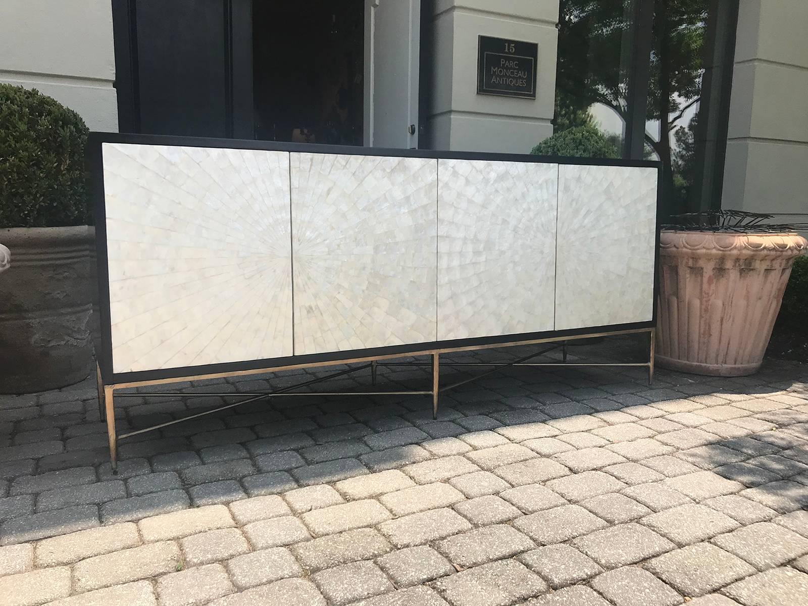 Long 20th century Bernhardt Capiz shell inlay credenza on brass feet with stretchers.