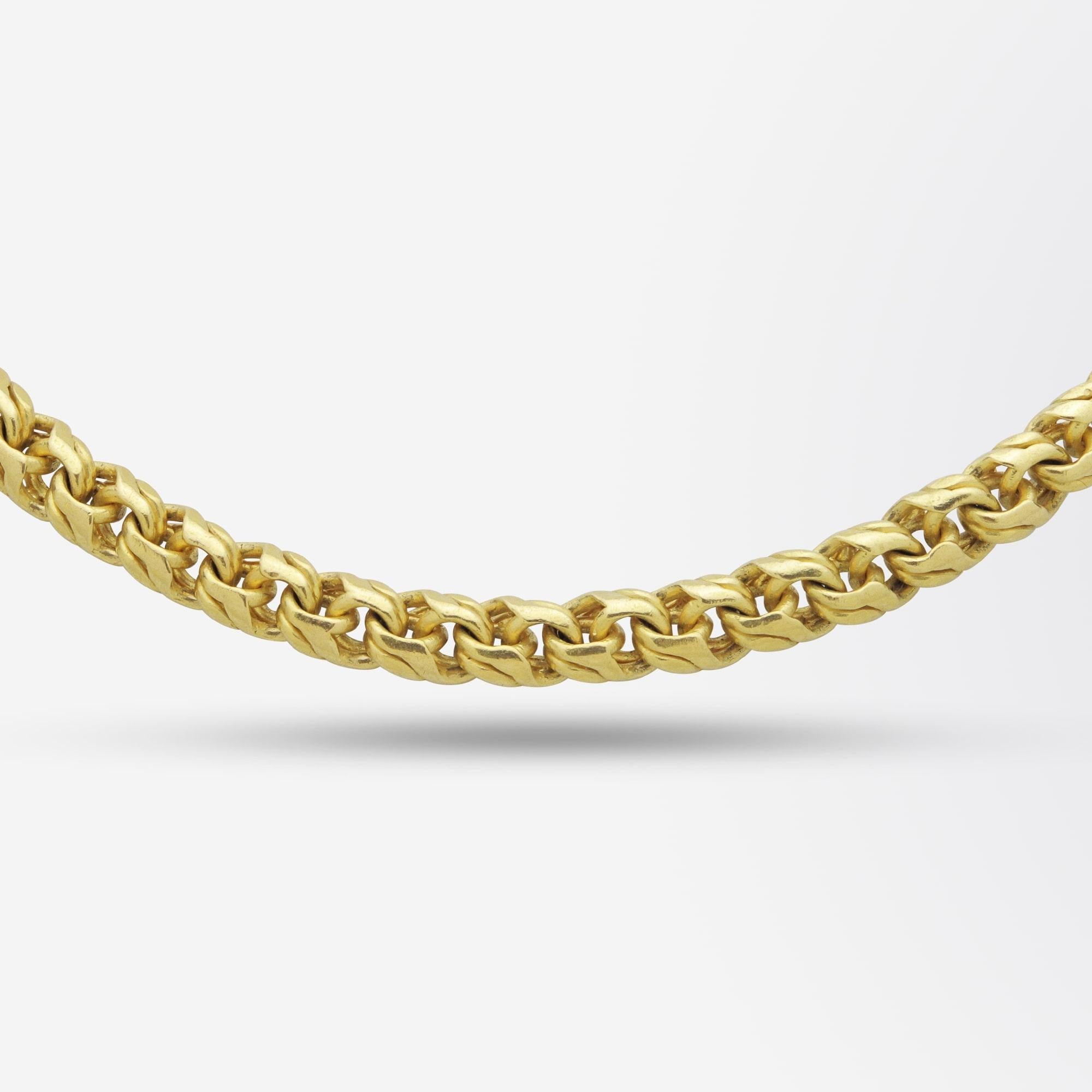 A beautifully made 23 karat yellow gold chain necklace with a 'baht' gold clasp. The fancy link chain has six rings where it can be secured with its clasp enabling it to be worn as long as 66cm in length or as short as 47.5cm in length. Beautifully